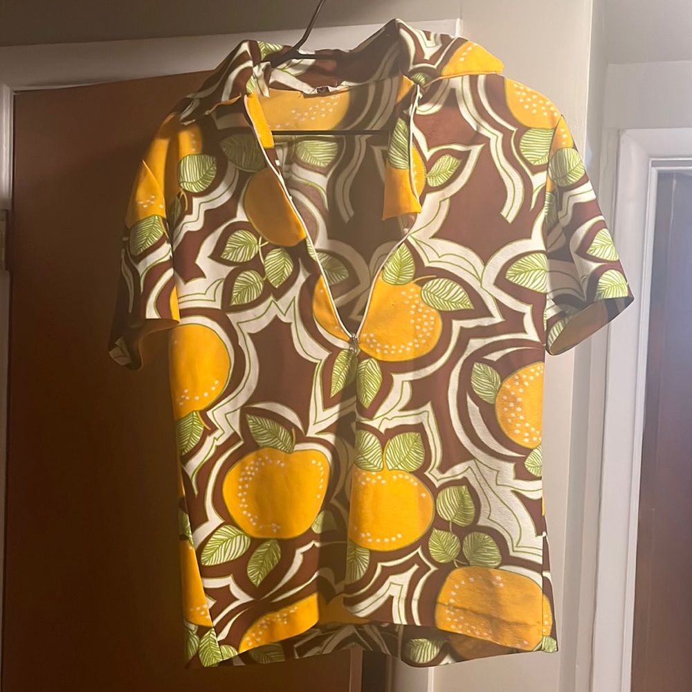 Peach 70’s shirt